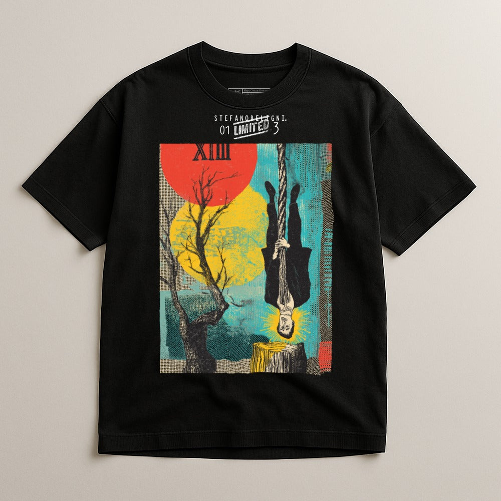 Black t-shirt with abstract art of man hanging from rope, tree, and geometric shapes.