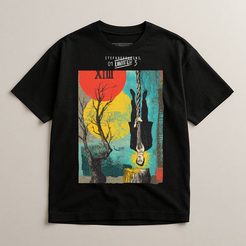 Black t-shirt with abstract art of man hanging from rope, tree, and geometric shapes.