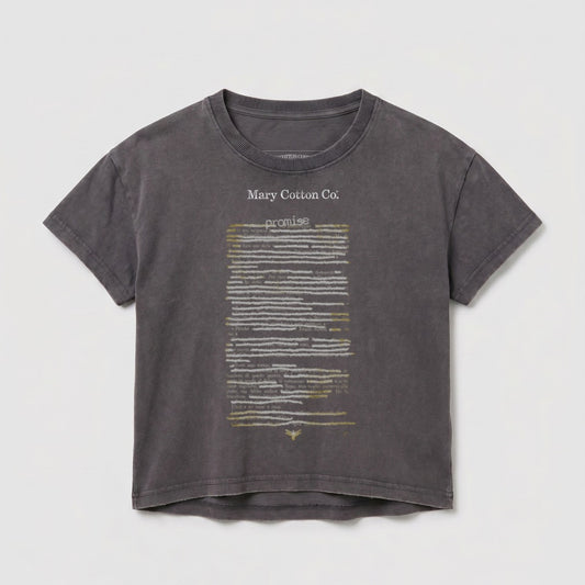 Dark grey t-shirt with "Mary Cotton Co." and a block of text and "promise" printed on it.