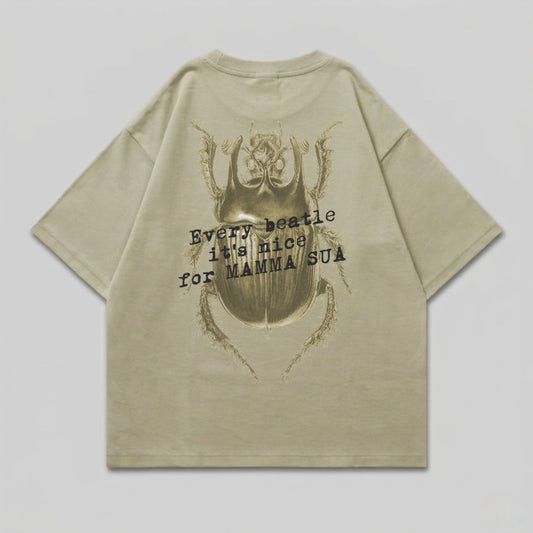Tan t-shirt with a large beetle graphic and text reading "Every beetle its nice for Mamma Sua".