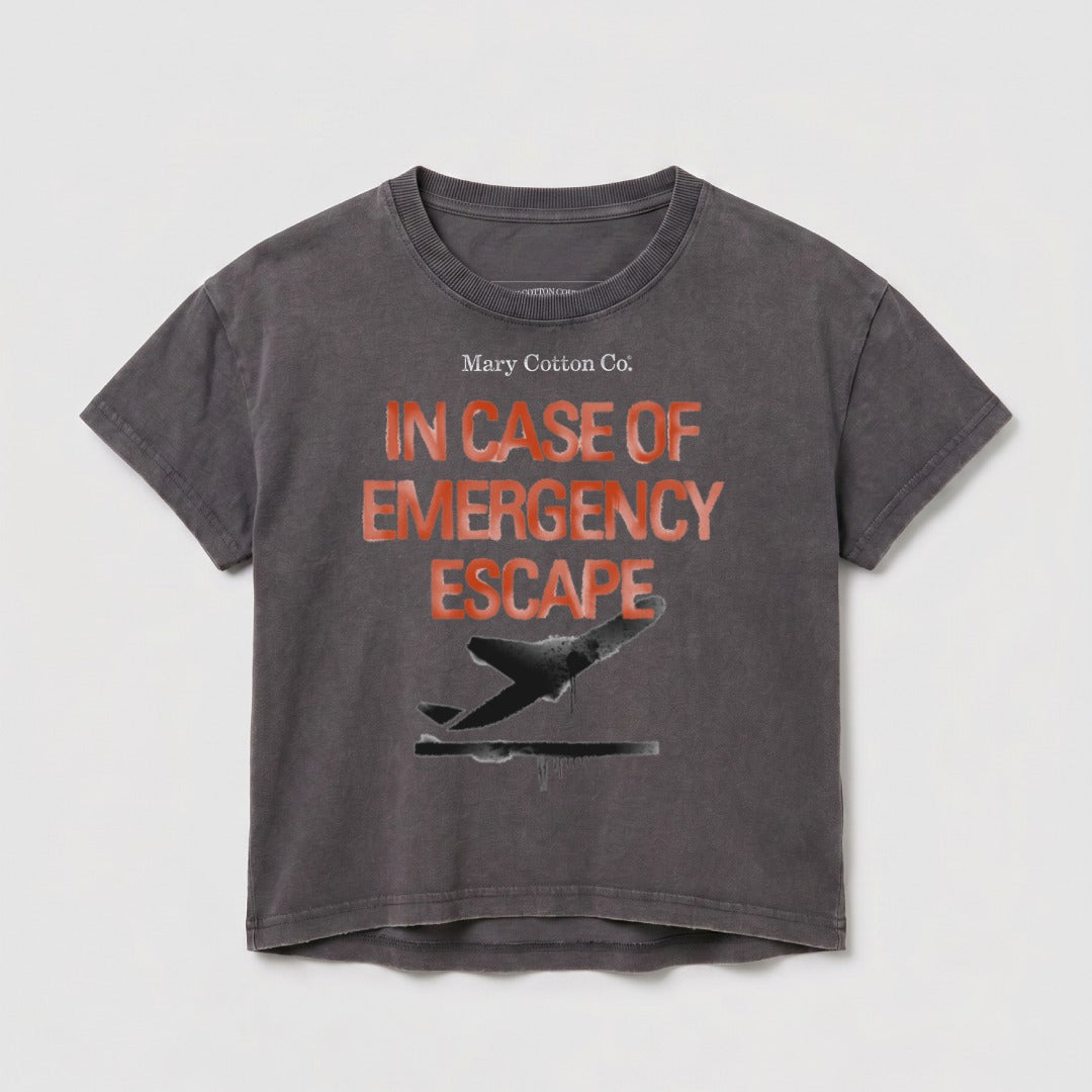 Grey t-shirt with "IN CASE OF EMERGENCY ESCAPE" and a silhouette of a plane.