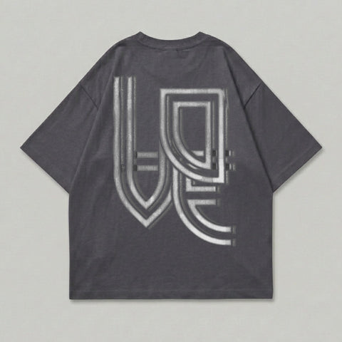 Charcoal t-shirt with a metallic, embossed geometric design on the back.