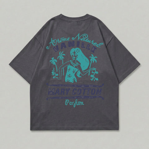 Dark grey t-shirt with blue graphic of woman, palm trees, and text "Arome Naturel Vanille Mary Cotton Parfum".