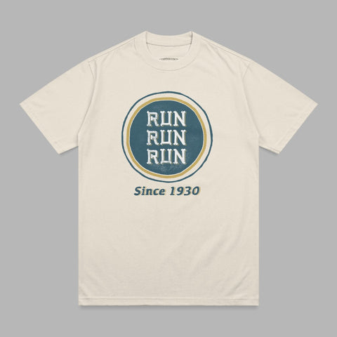 Cream t-shirt with "RUN RUN RUN" in a circle, "Since 1930" below.