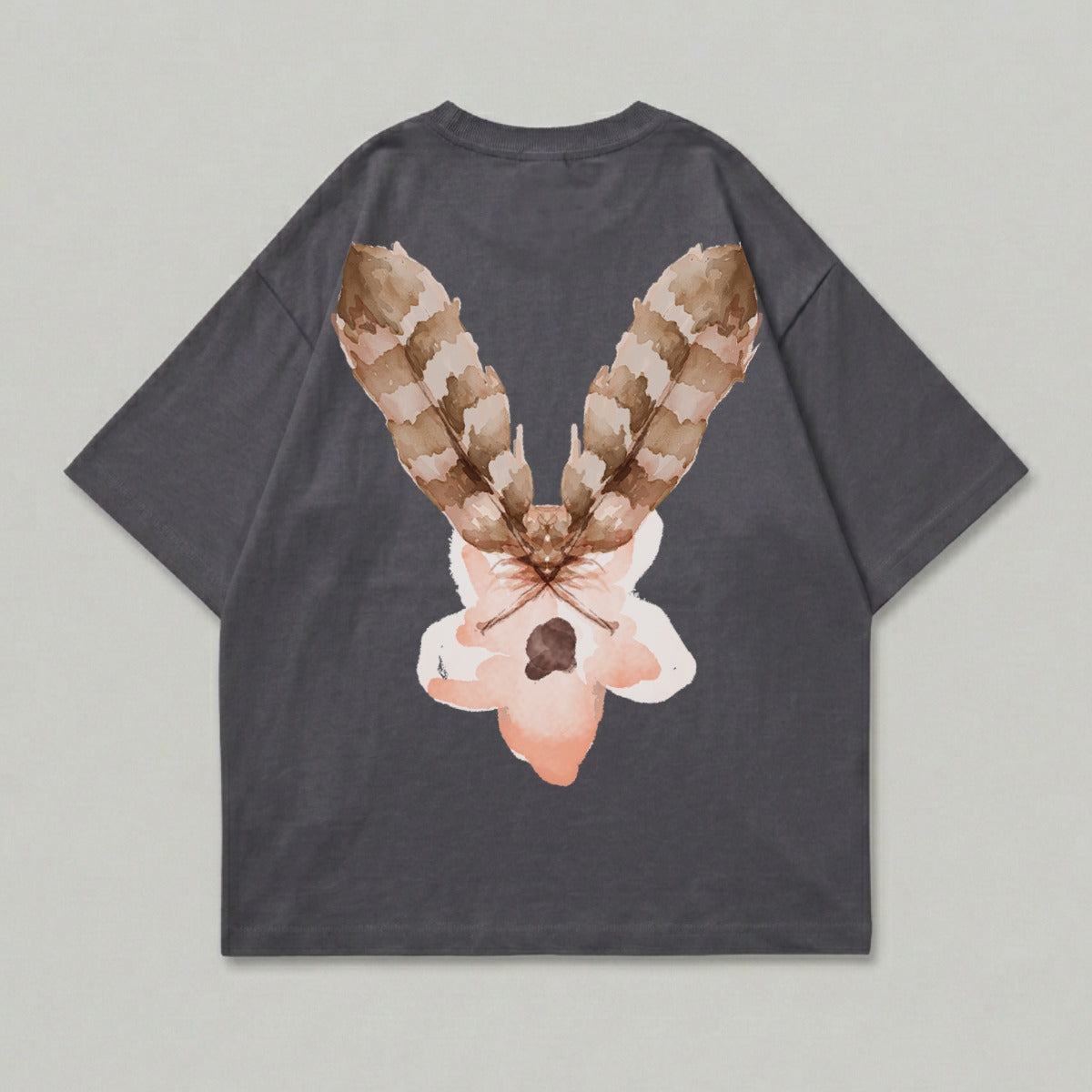 Dark grey t-shirt with a watercolor moth and flower design on the back.