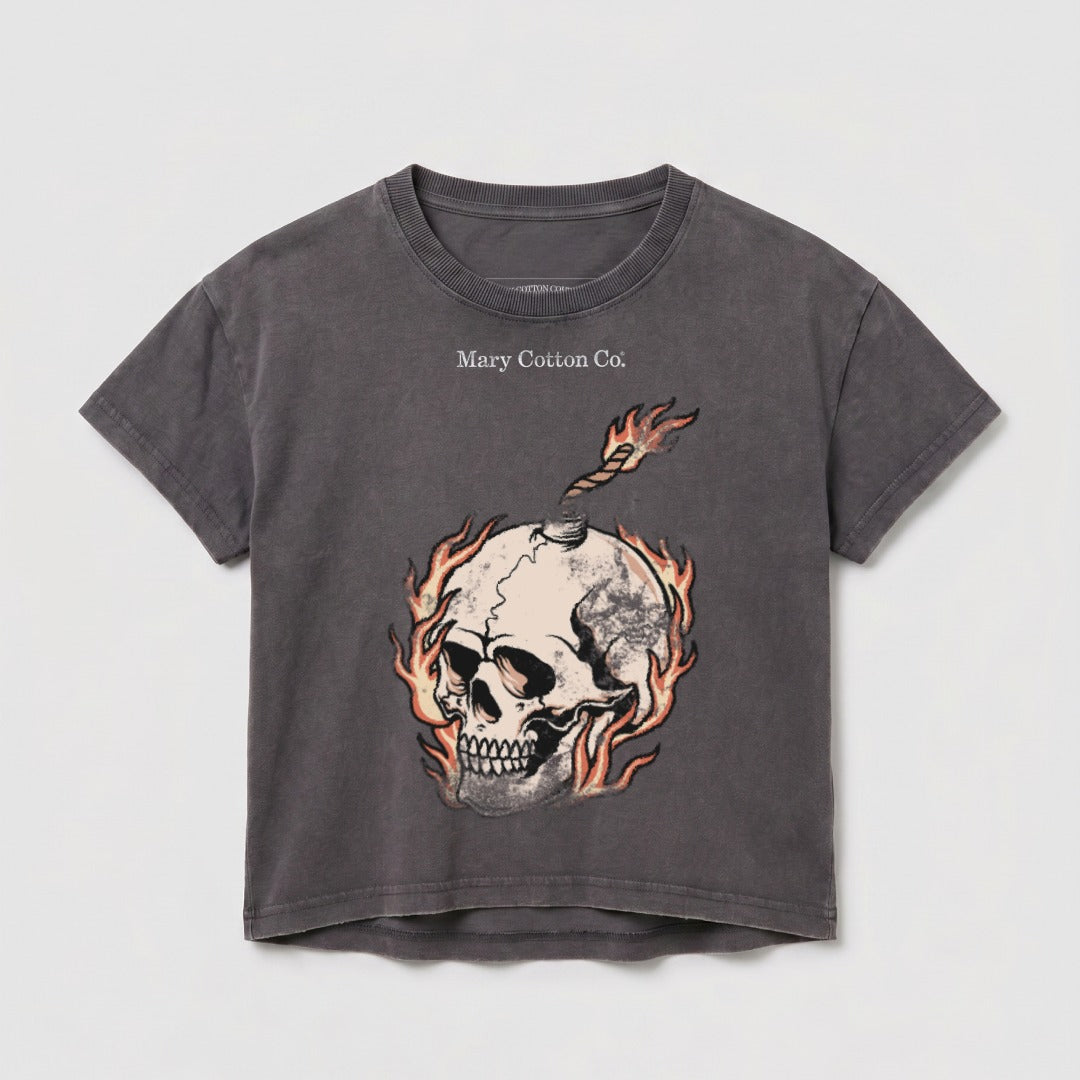 Dark grey t-shirt with skull, bomb fuse, and flames graphic and "Mary Cotton Co." text.