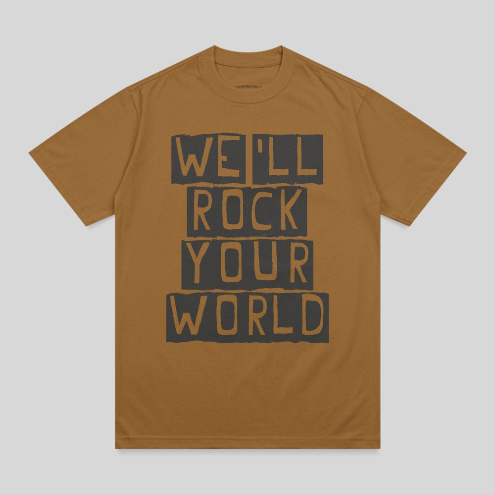 Brown t-shirt with black text reading "WE'LL ROCK YOUR WORLD" in stacked blocks.