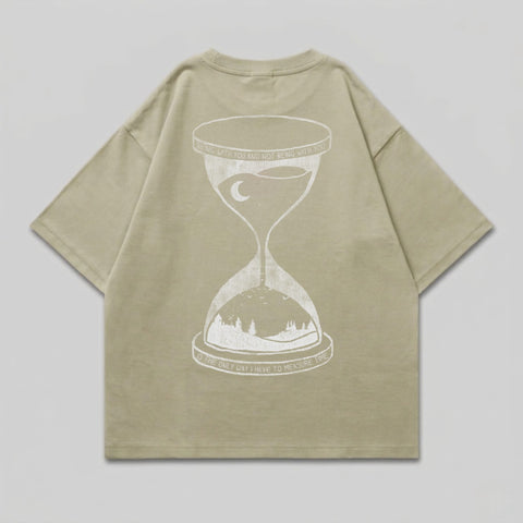Beige t-shirt with hourglass design and quote.