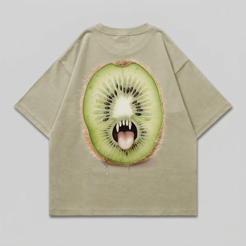T-shirt with a cartoon kiwi fruit design featuring a face with fangs and tongue.