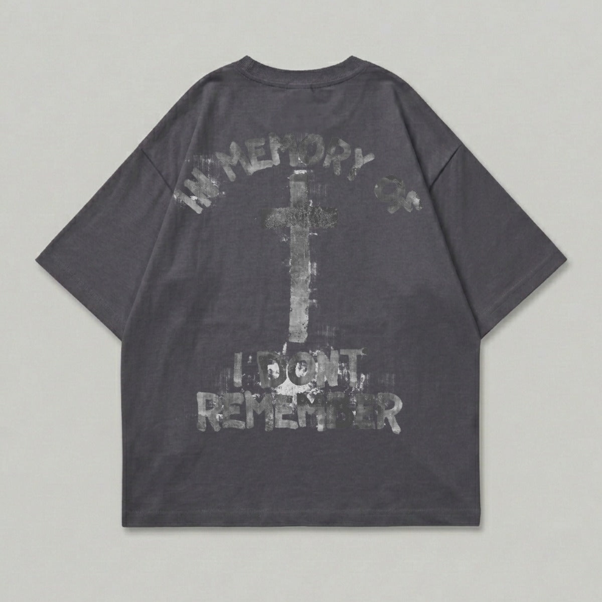 Dark gray t-shirt with distressed cross and text graphics on the back.