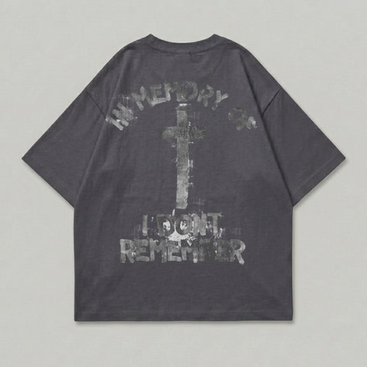 Dark gray t-shirt with distressed cross and text graphics on the back.