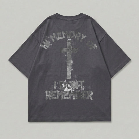 Dark gray t-shirt with distressed cross and text graphics on the back.