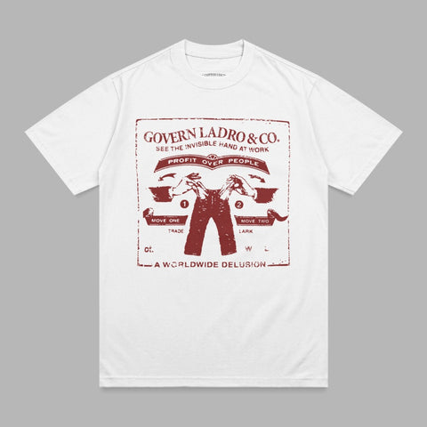 T-shirt with distressed red graphic of hands, gears, and text about profit over people.