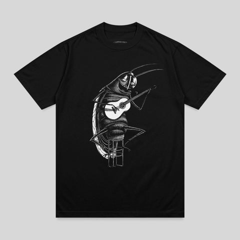 Black t-shirt with a black and white illustration of a cockroach playing a guitar.