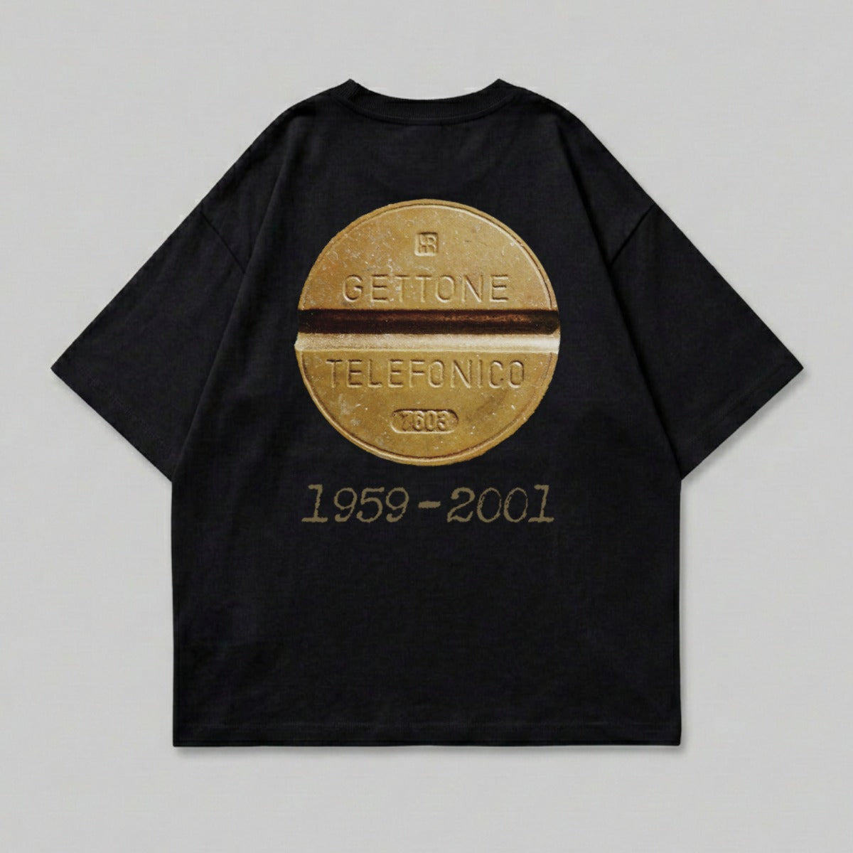 Black t-shirt with vintage Telefonica coin graphic and "1959-2001" text.
