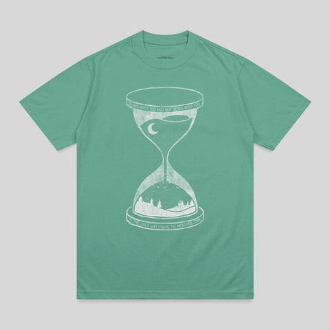 Green t-shirt with hourglass graphic and text "Being with you and not being with you is the only way I have to measure time."