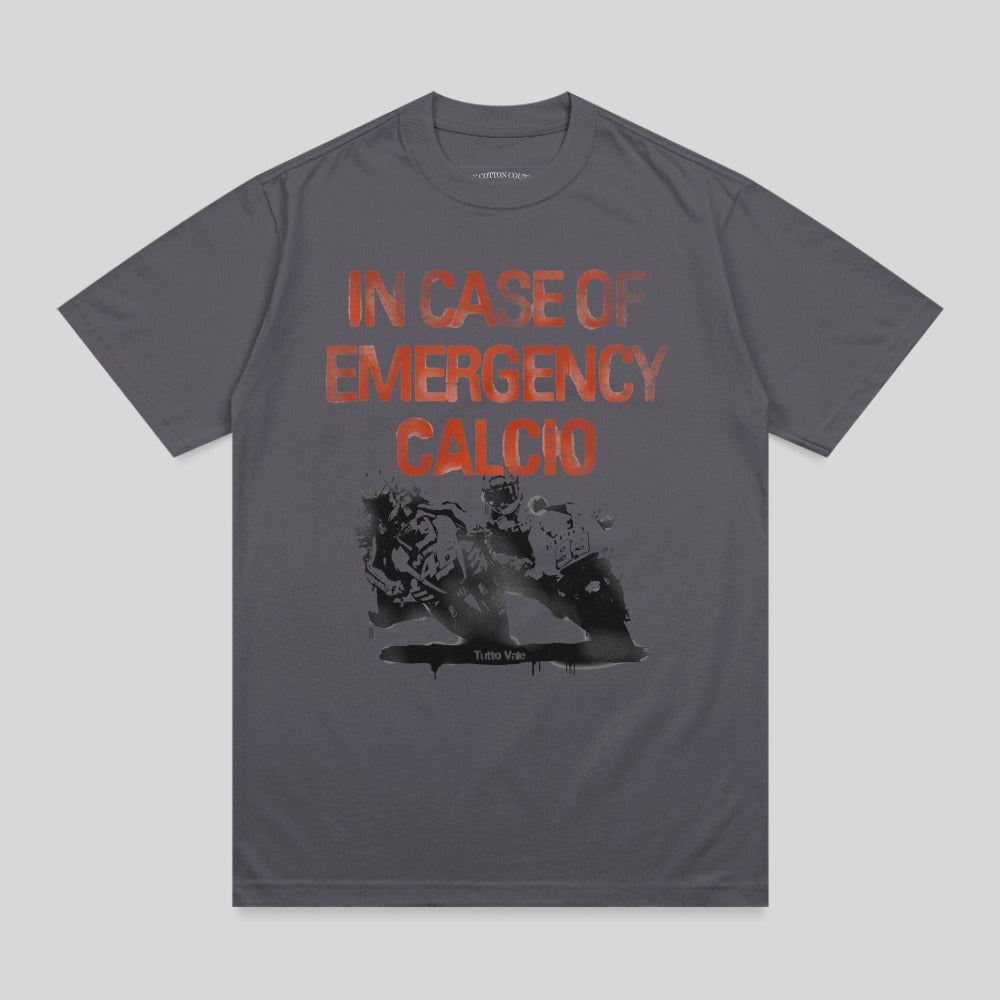 T-shirt with "IN CASE OF EMERGENCY CALCIO" and a graphic of motorcycles.