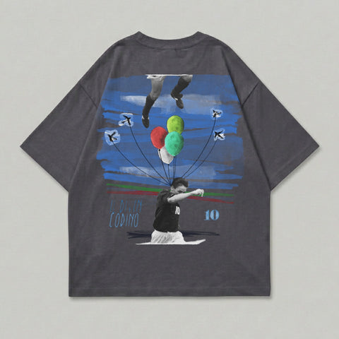 T-shirt with football player Roberto Baggio releasing balloons, text reads "BAGGIO CODINO".