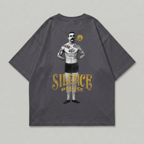 T-shirt with illustration of man smoking pipe and "SILENCE PLEASE" text.
