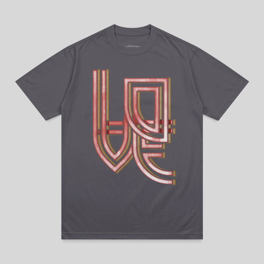 Dark grey t-shirt with red and gold geometric graphic design.