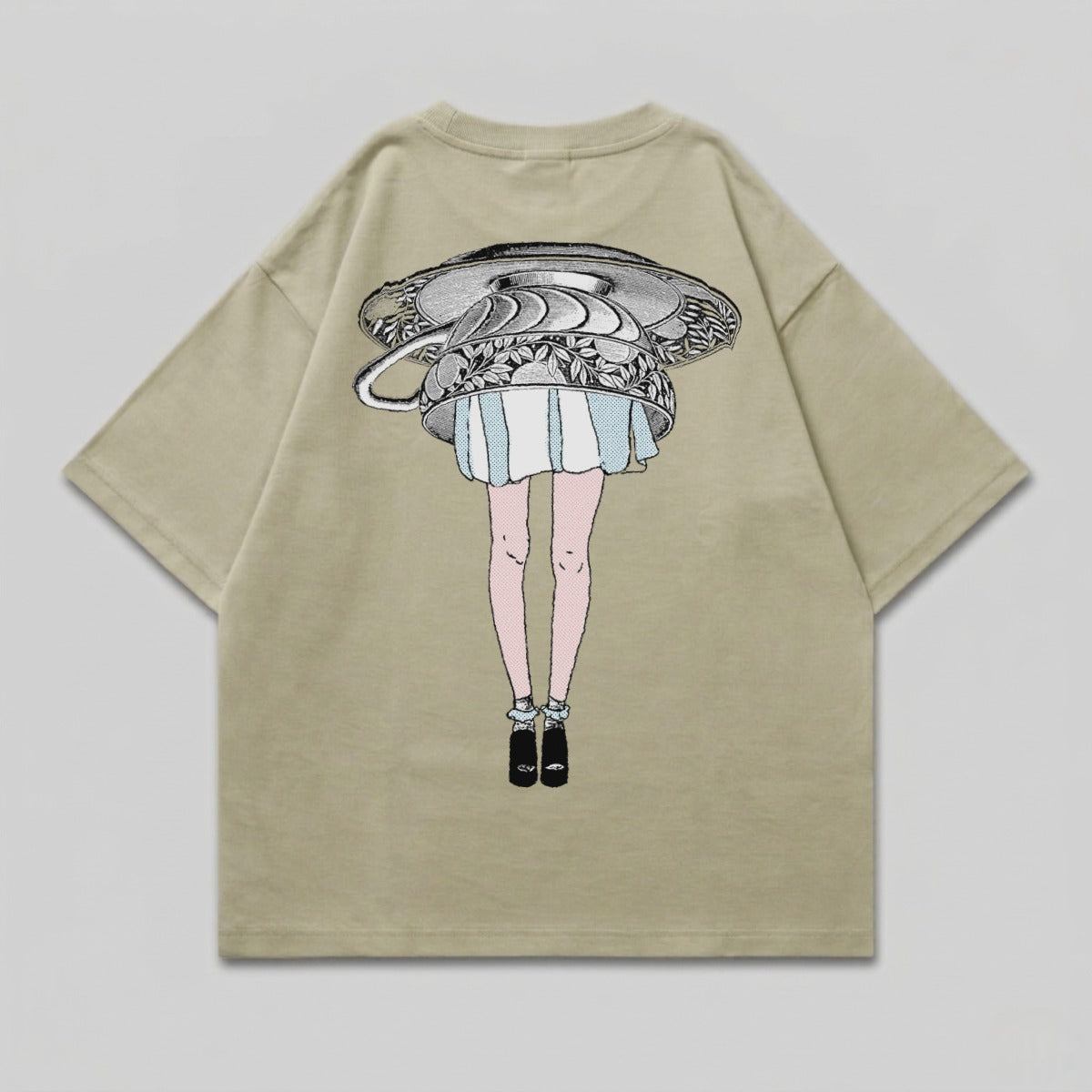 Khaki t-shirt with embroidered design of a woman's legs, teacup, and dress.