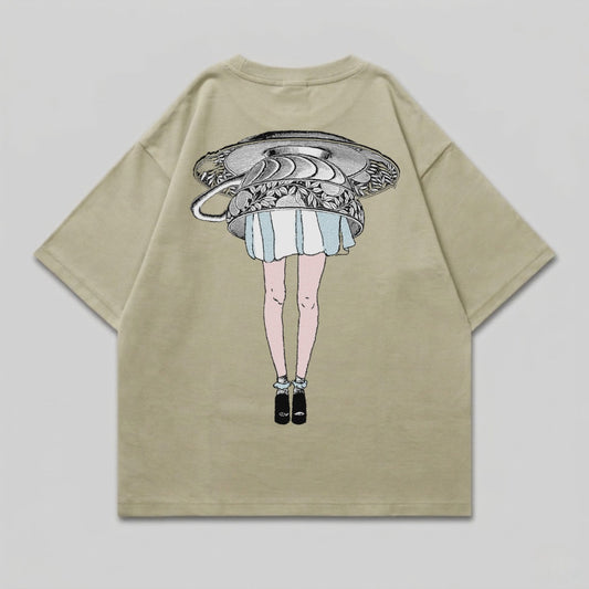 Khaki t-shirt with embroidered design of a woman's legs, teacup, and dress.