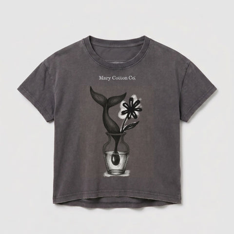 T-shirt with a vase, flower, and whale tail illustration and "Mary Cotton Co." text.