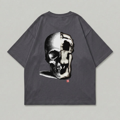 Dark grey t-shirt with a split skull and human figure graphic.