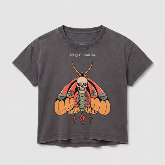 Dark grey t-shirt with a stylized moth and skull graphic and "Mary Cotton Co." text.