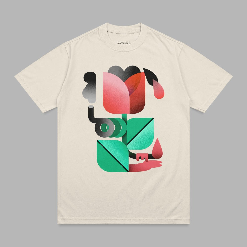 Cream t-shirt with abstract geometric flower and green leaves design.