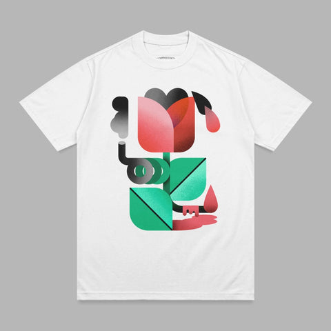 White t-shirt with abstract red and green floral design and human hand element.