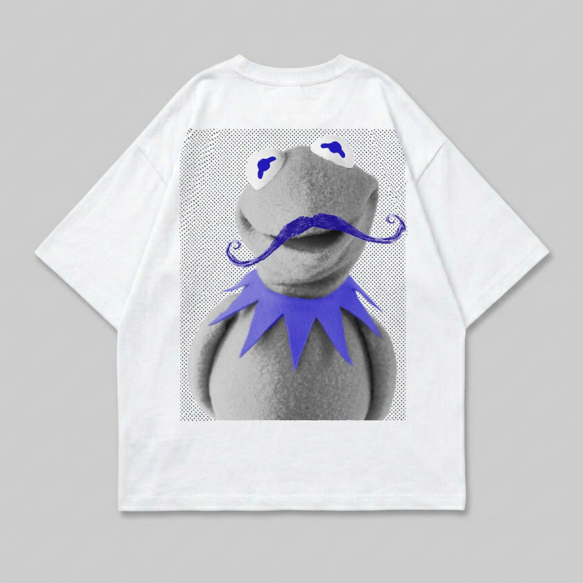 Kermit the Frog wearing a purple mustache and blue collar on a white t-shirt.