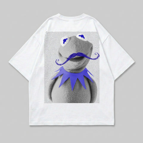 Kermit the Frog wearing a purple mustache and blue collar on a white t-shirt.