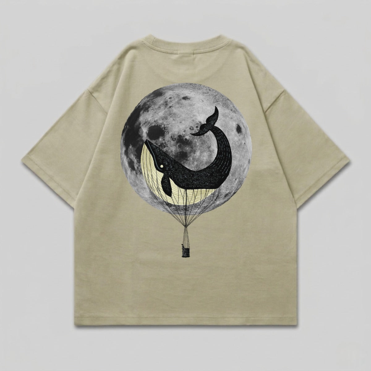 T-shirt with a black whale in a hot air balloon against a full moon.