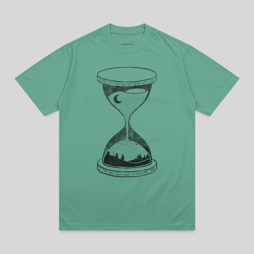Green t-shirt with hourglass design and text: "Being with you and not being with you is the only way I have to measure time."