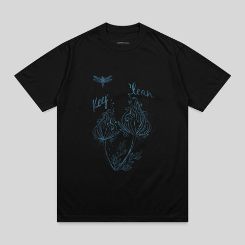 Black t-shirt with blue floral and dragonfly design and "Keep clean" text.