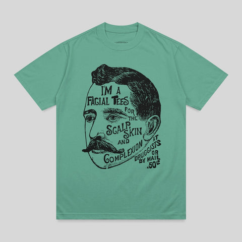 Black and white illustration of a man's face on a green t-shirt.