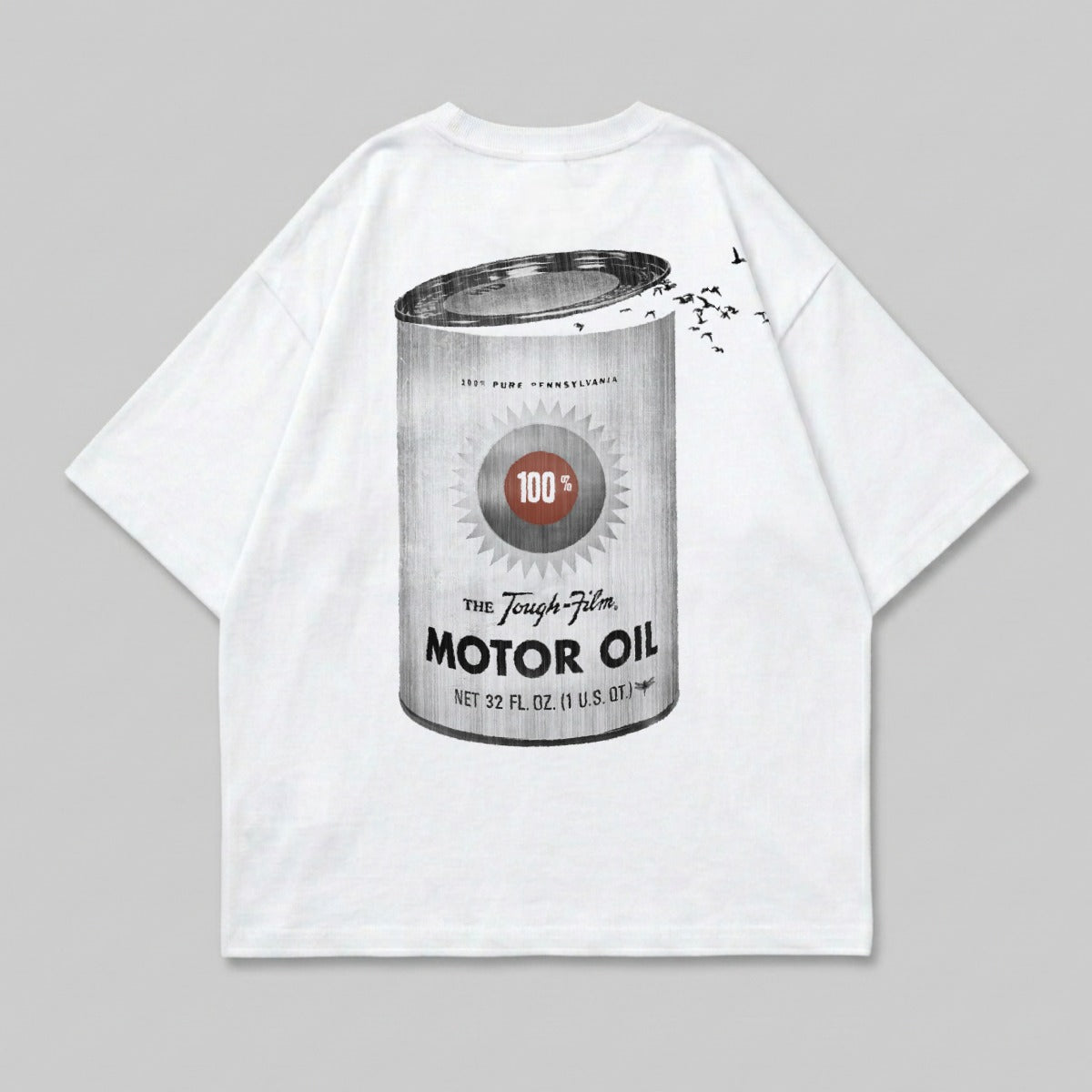 White t-shirt with a vintage motor oil can graphic.