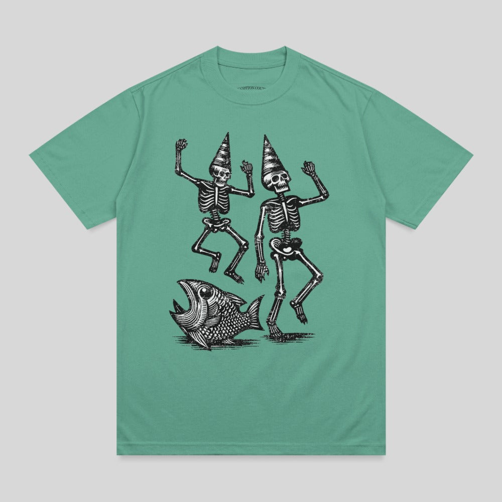 Two skeletons in party hats dance with a fish.