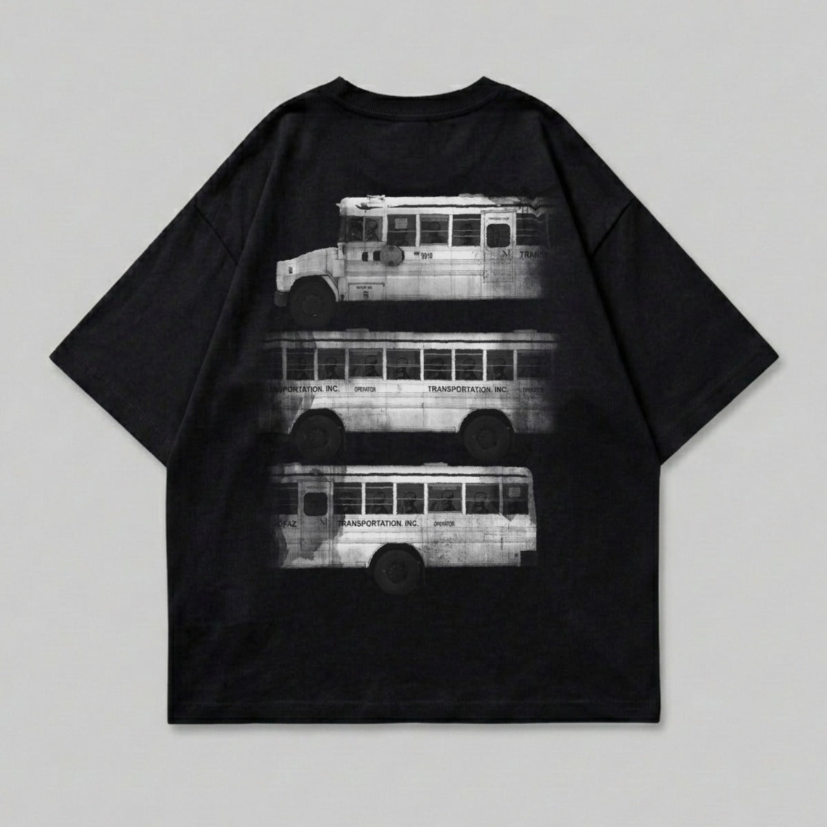 Black t-shirt with three stacked, stylized white buses printed on the back.