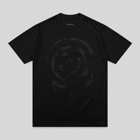 Black t-shirt with a circular, distressed graphic design and a small logo.