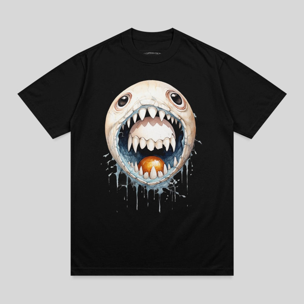 Black t-shirt with a cartoonish monster face with large teeth and a glowing orange sphere in its mouth.
