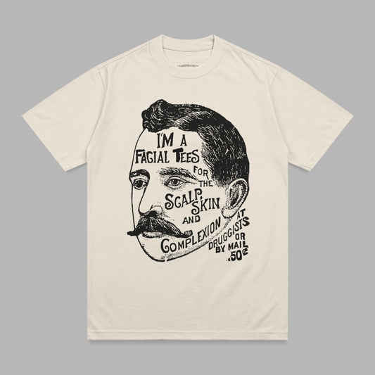 Cream t-shirt with man's head graphic and text about facial treatments.