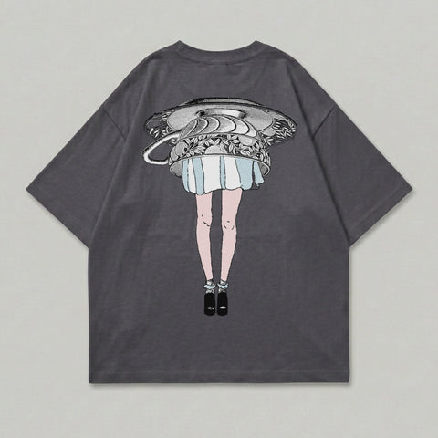 Graphic t-shirt with illustration of a woman's legs below a teacup.