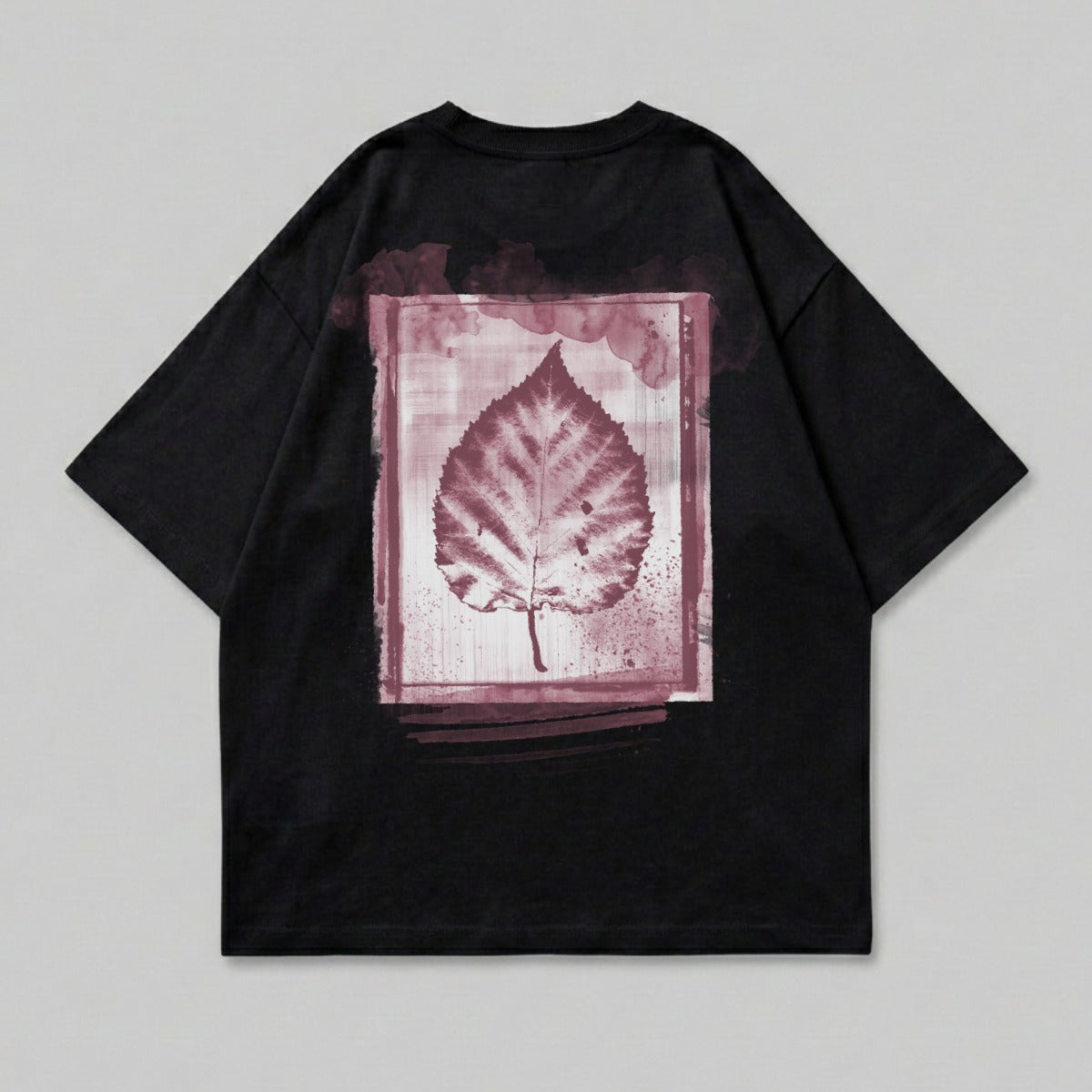 Black t-shirt with a large, red leaf print on the back.
