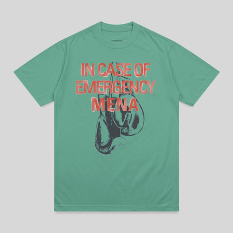 Green t-shirt with "IN CASE OF EMERGENCY MENA" and boxing gloves graphic.