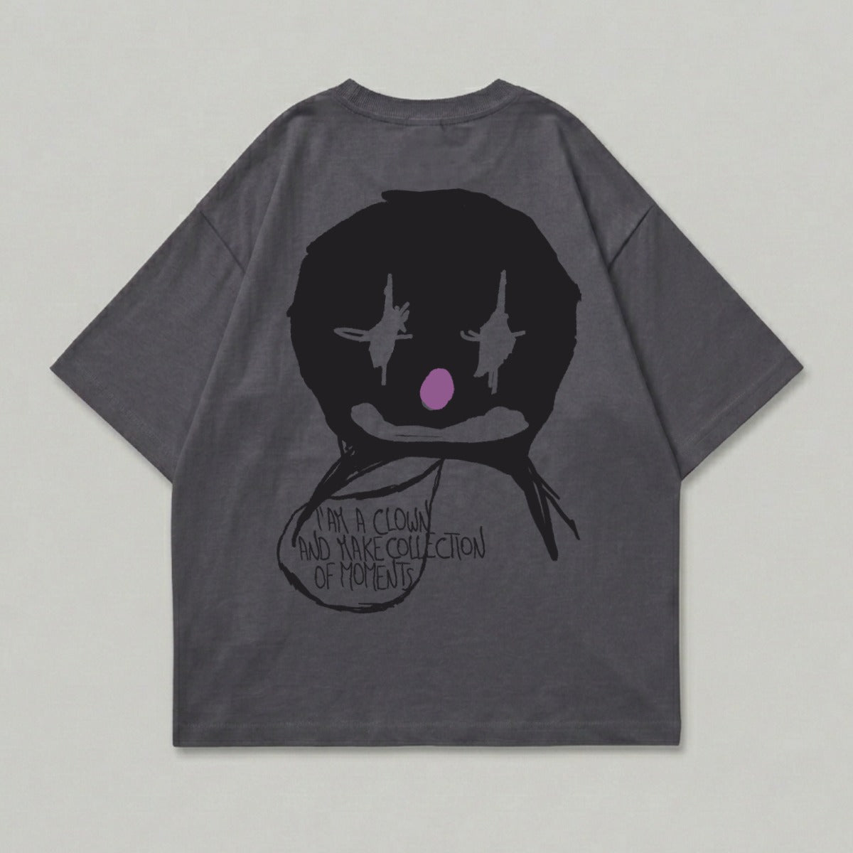 Dark grey t-shirt with a black clown face graphic and text.