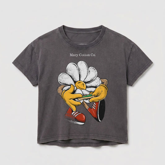 Dark grey t-shirt with cartoon daisy character holding a lit cigarette.