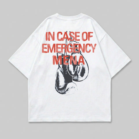 White t-shirt with red text "IN CASE OF EMERGENCY" above boxing gloves.