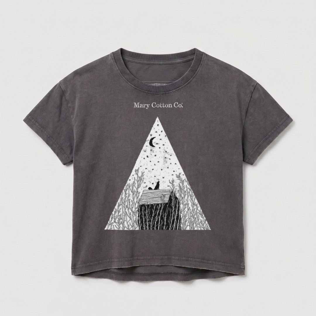 Grey t-shirt with a triangular design featuring a moon, stars, and a house.